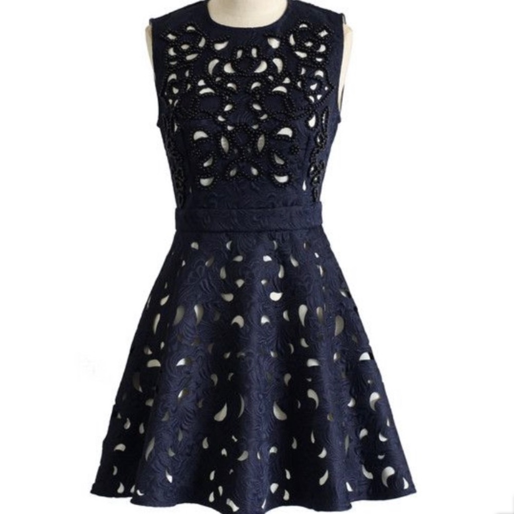 Navy cutout fit and flare dress